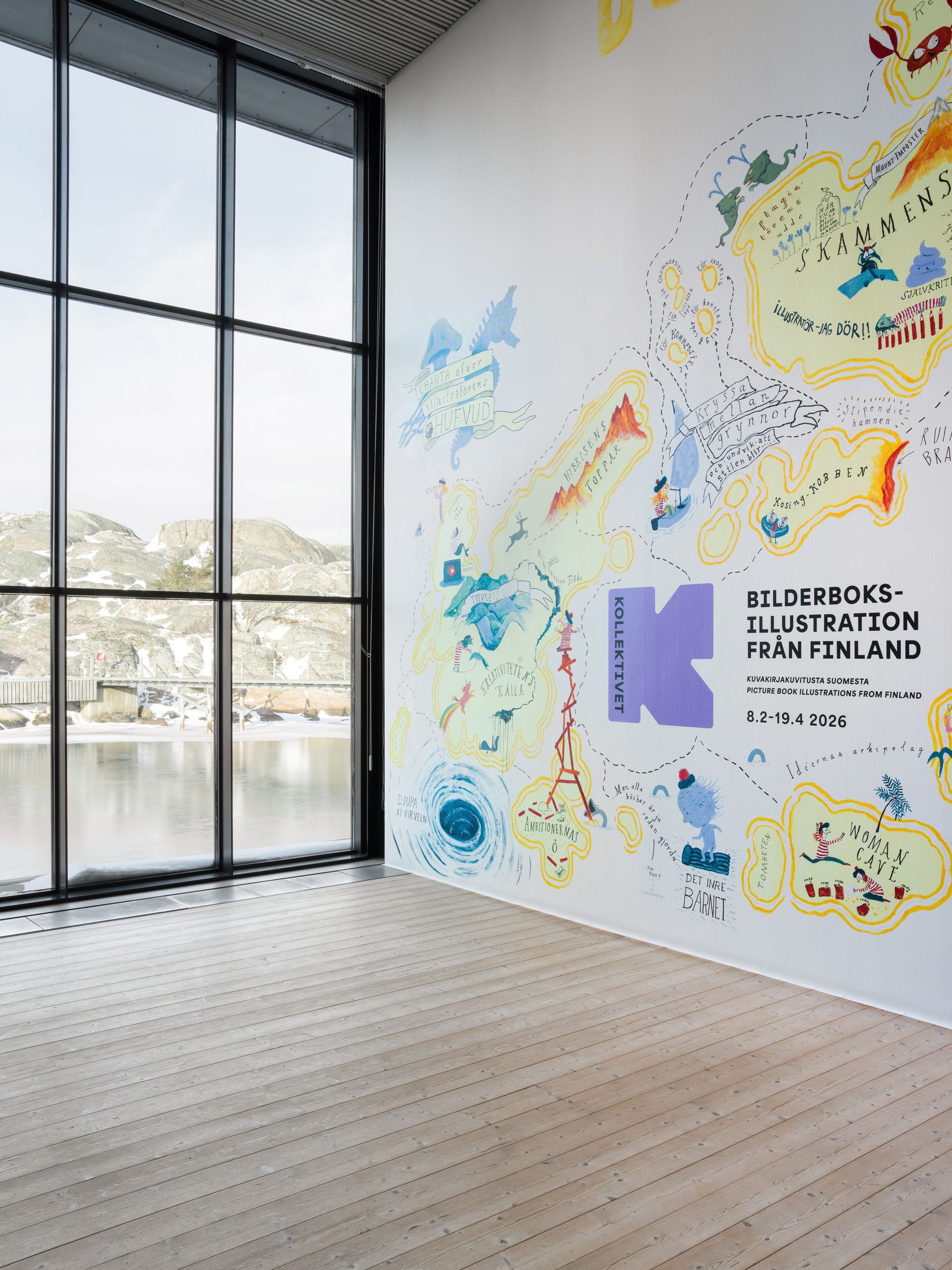 Muralmålning och fönster med utsikt över klipporna